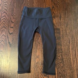Black mesh Lululemon capri leggings